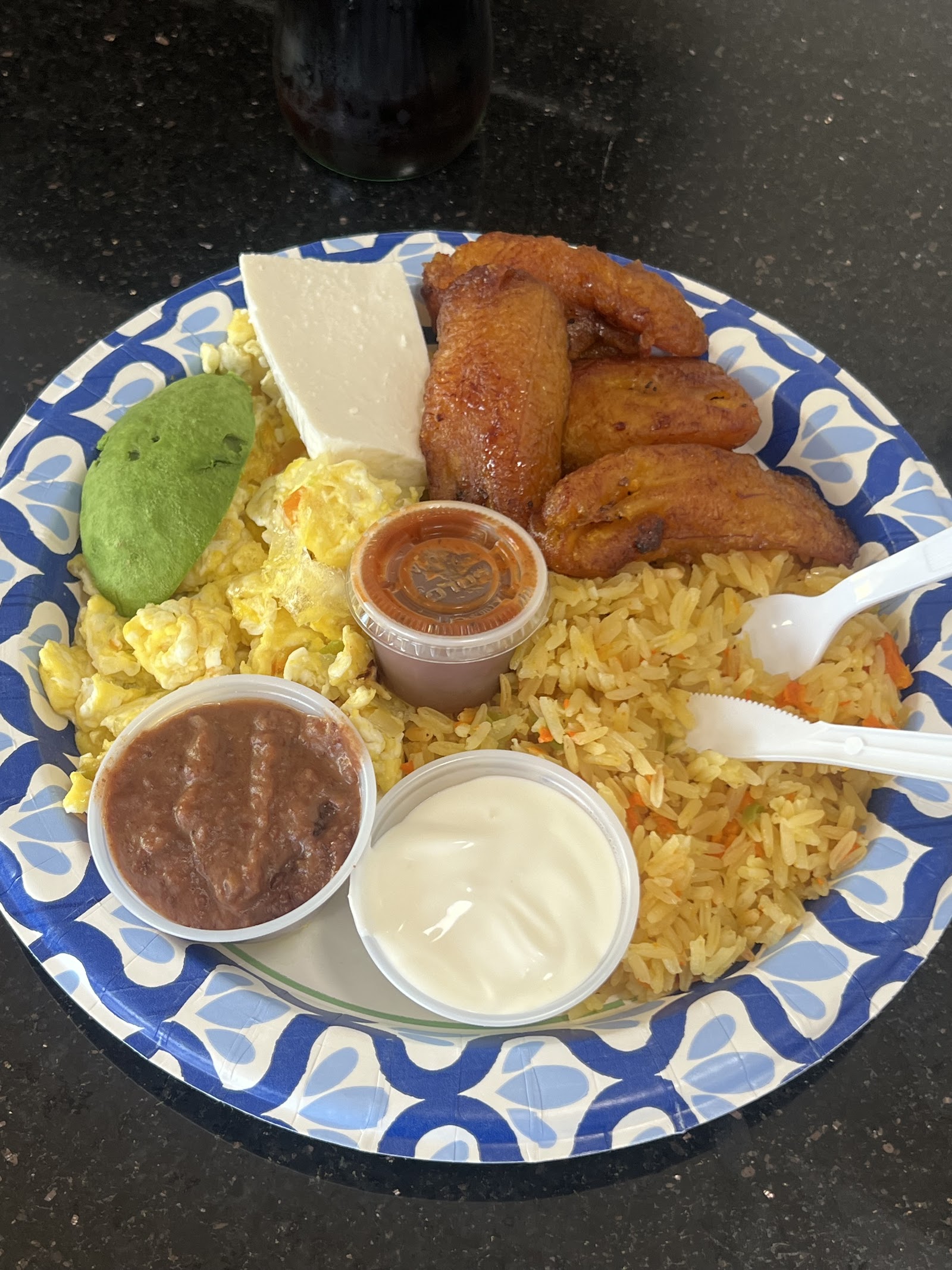 Plantains, eggs, beans, rice combo plate
