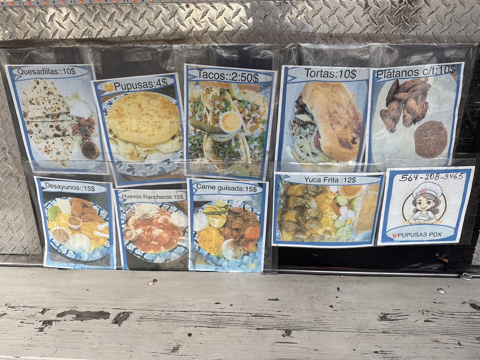 Painted menu board with prices